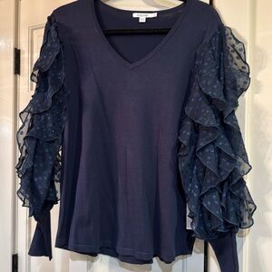 Chicos size 2 (large) v-neck sweater with a sheer ruffle sleeve in navy blue.